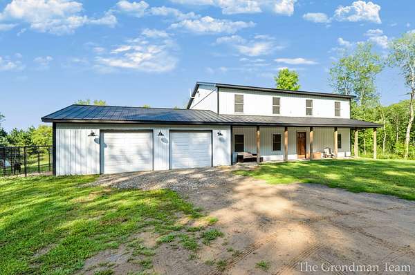 32.9 Acres of Land with Home for Sale in Greenville, Michigan