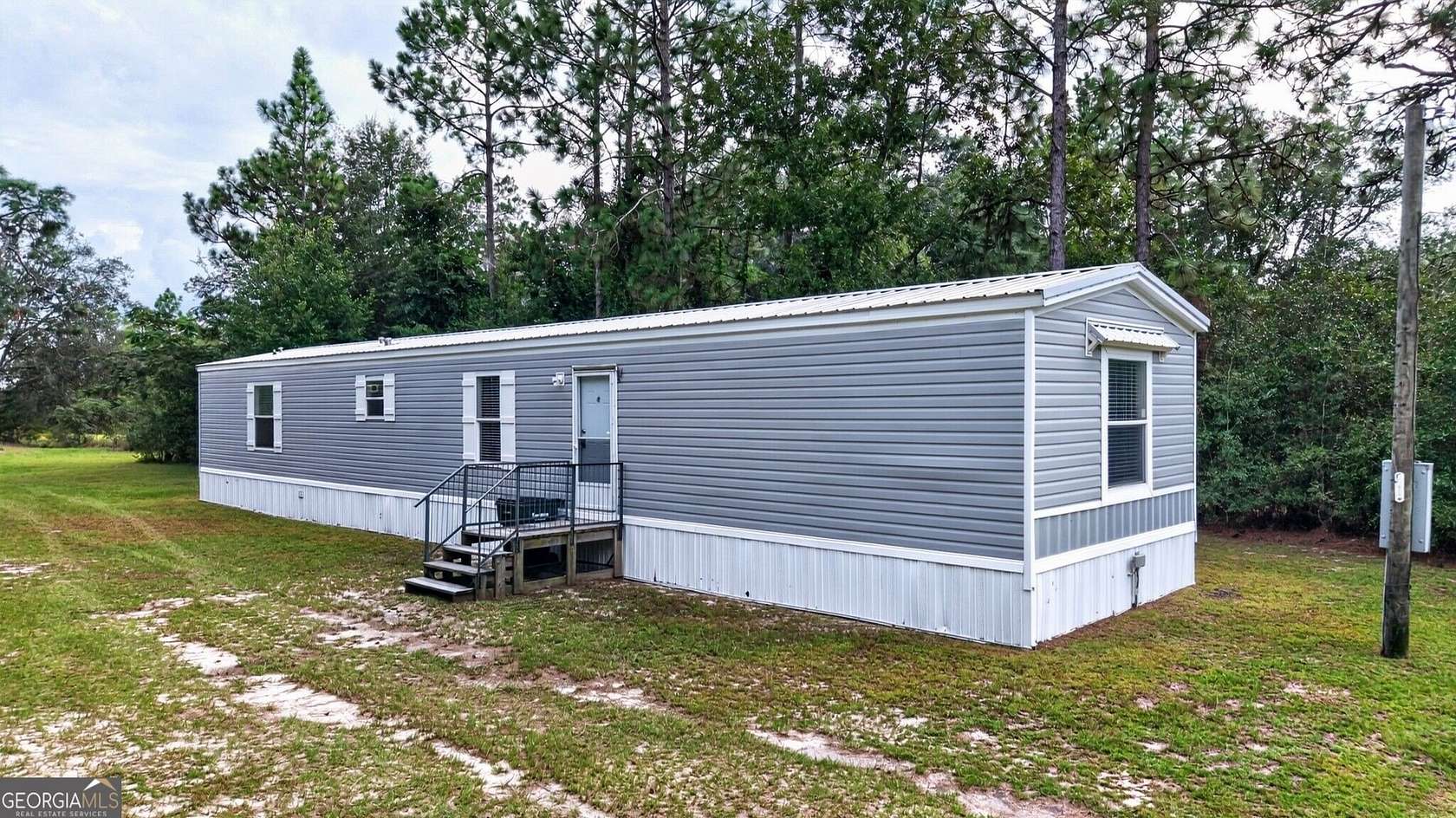 1.5 Acres of Land with Home for Sale in Reidsville, Georgia