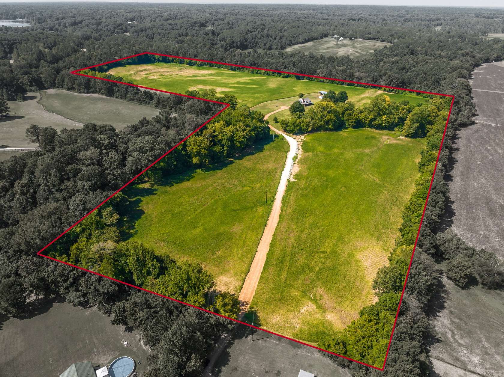49.2 Acres of Land with Home for Sale in Drummonds, Tennessee