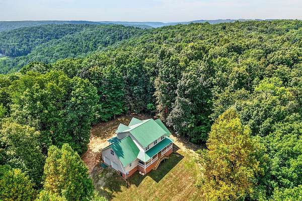 26.4 Acres of Recreational Land with Home for Sale in Pikeville, Tennessee