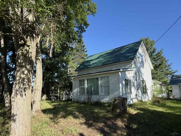 8.77 Acres of Land with Home for Sale in Prescott, Michigan