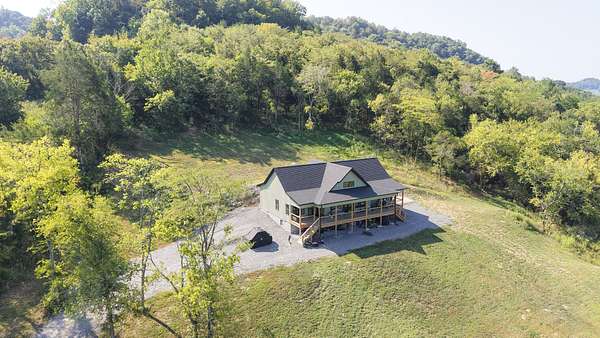 15.4 Acres of Land with Home for Sale in Dixon Springs, Tennessee