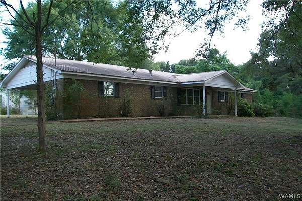 8.69 Acres of Land with Home for Sale in Coker, Alabama