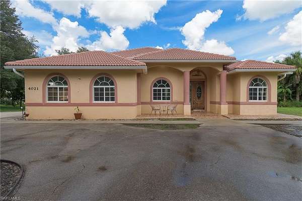 2.27 Acres of Land with Home for Sale in Naples, Florida