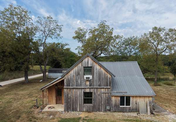 10 Acres of Recreational Land with Home for Sale in Louisburg, Missouri