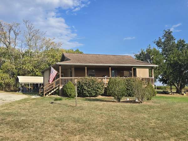 3 Acres of Land with Home for Sale in Wheatland, Missouri