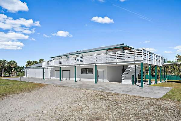 5 Acres of Land with Home for Lease in Palm City, Florida