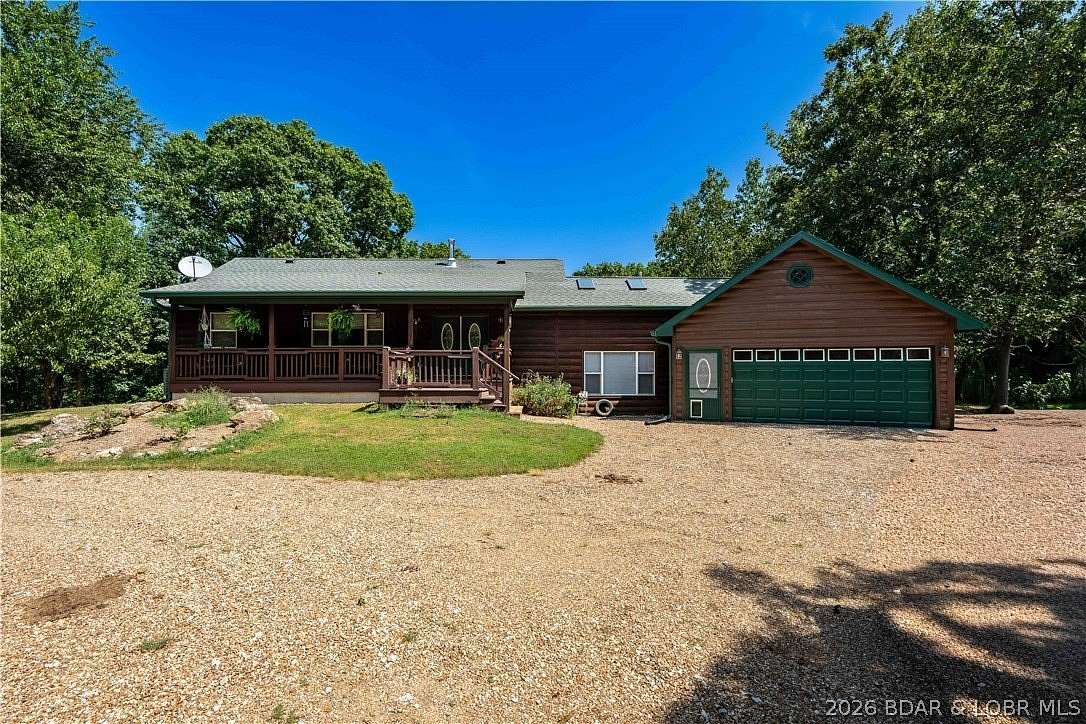 51 Acres of Recreational Land with Home for Sale in Edwards, Missouri