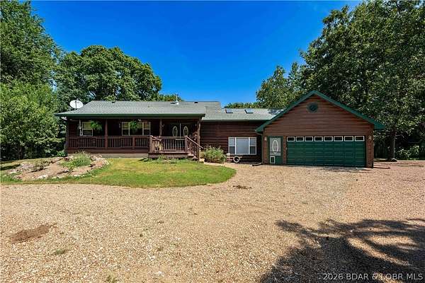 51 Acres of Recreational Land with Home for Sale in Edwards, Missouri