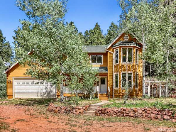 3 Acres of Land with Home for Sale in Larkspur, Colorado