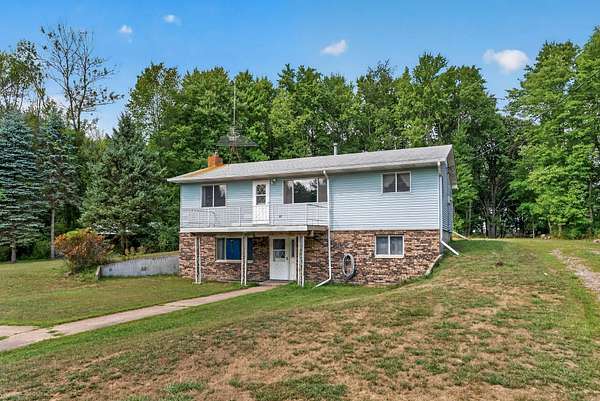 3.48 Acres of Land with Home for Sale in Isanti, Minnesota