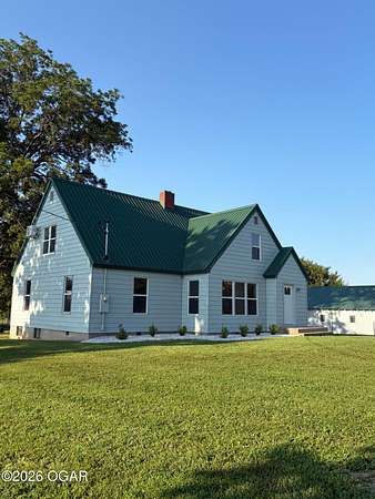 4.9 Acres of Land with Home for Sale in Sarcoxie, Missouri