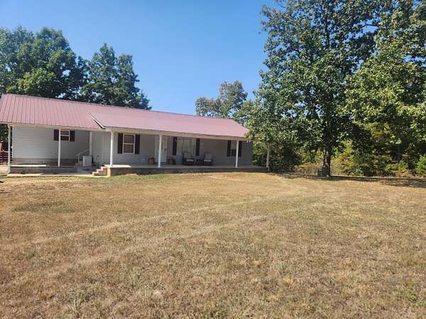 10.2 Acres of Land with Home for Sale in Harrison, Arkansas