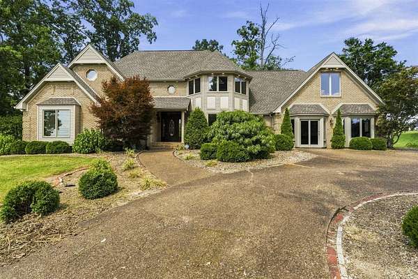 3.37 Acres of Land with Home for Sale in Scottsville, Kentucky
