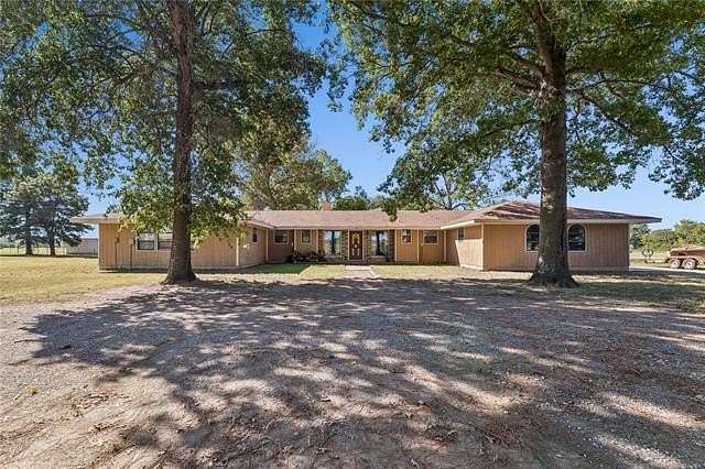 20 Acres of Agricultural Land with Home for Sale in Wagoner, Oklahoma