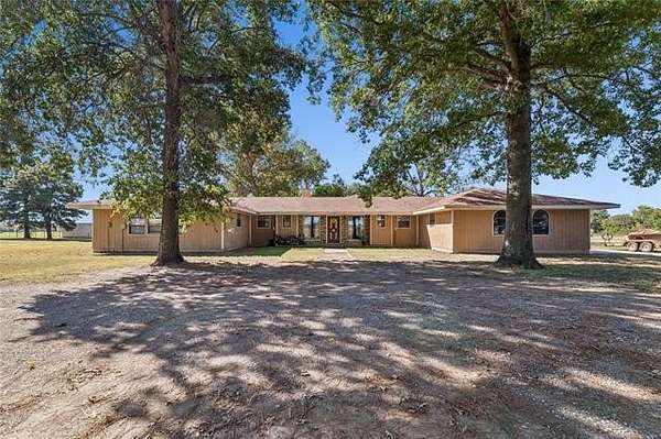 20 Acres of Agricultural Land with Home for Sale in Wagoner, Oklahoma
