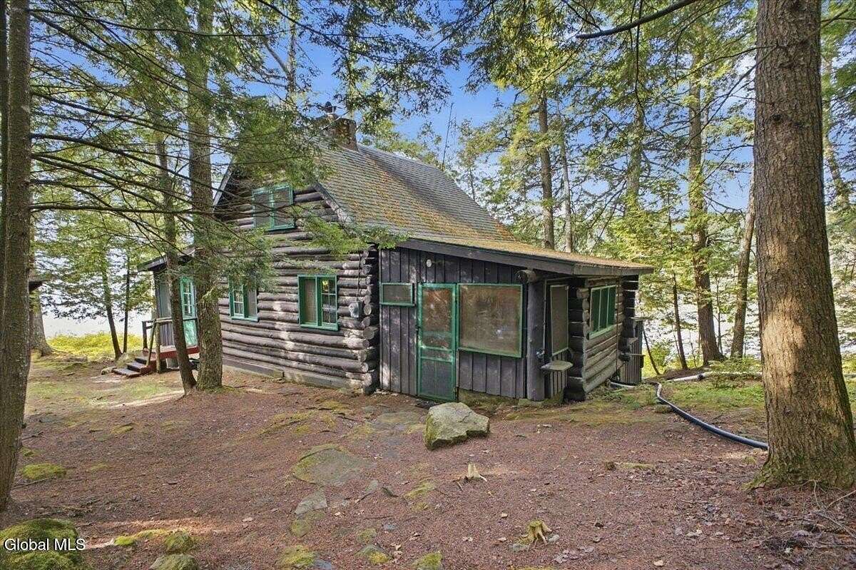 12.2 Acres of Land with Home for Sale in Schroon Lake, New York