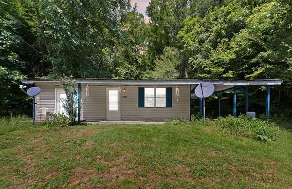 4.89 Acres of Land with Home for Sale in Bledsoe, Kentucky