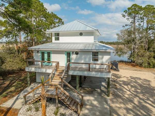 1.64 Acres of Land with Home for Sale in Carrabelle, Florida