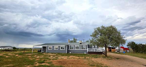 6.84 Acres of Land with Home for Sale in Moriarty, New Mexico