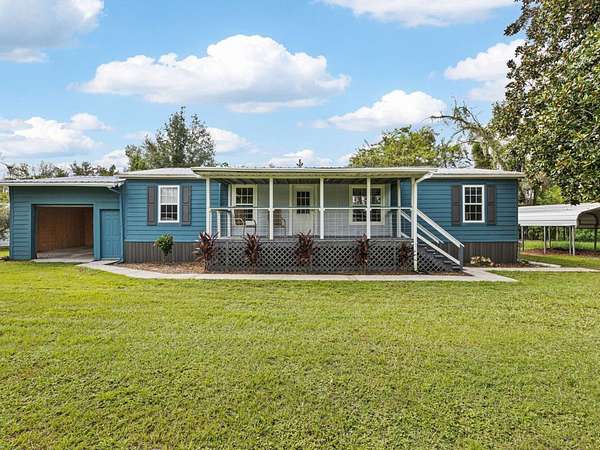 4.8 Acres of Land with Home for Sale in Lee, Florida