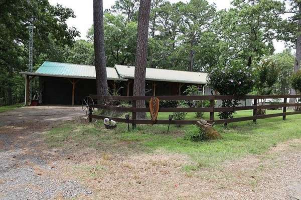 1.74 Acres of Land with Home for Sale in Hodgen, Oklahoma