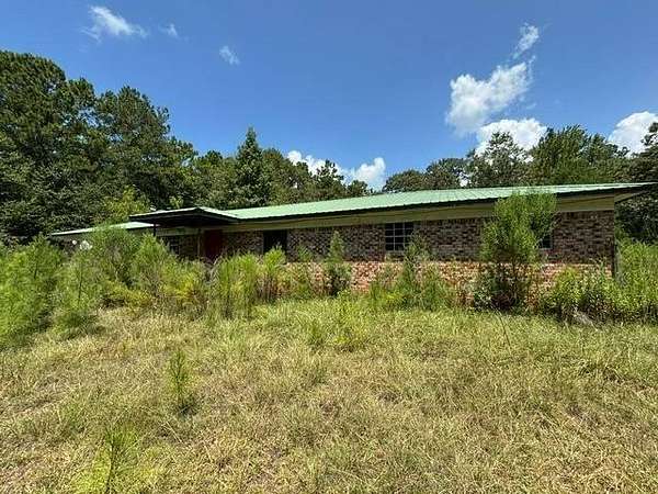 9.3 Acres of Land with Home for Sale in Citronelle, Alabama