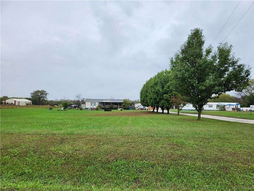 8.9 Acres of Land with Home for Sale in Clinton, Missouri