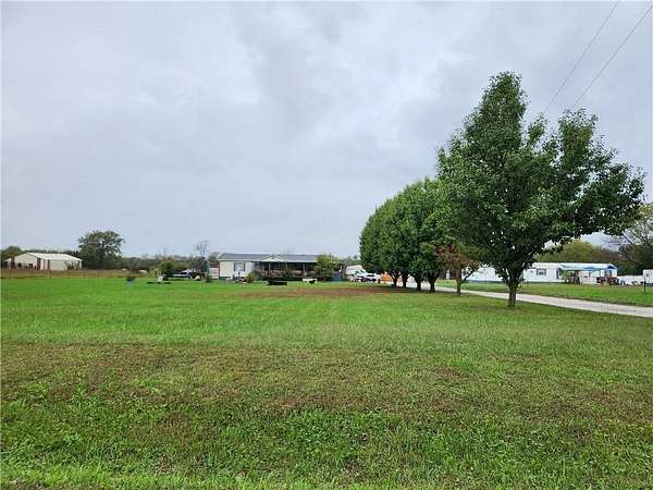 8.9 Acres of Land with Home for Sale in Clinton, Missouri