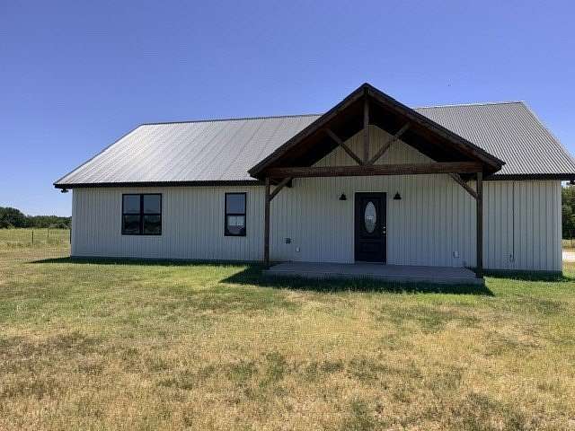 5.82 Acres of Land with Home for Sale in Aquilla, Texas