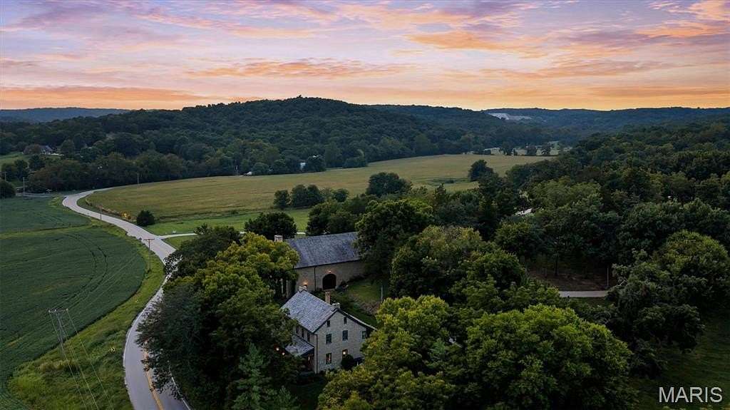 105 Acres of Agricultural Land with Home for Sale in Defiance, Missouri