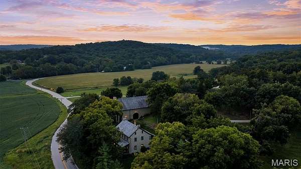 105 Acres of Agricultural Land with Home for Sale in Defiance, Missouri