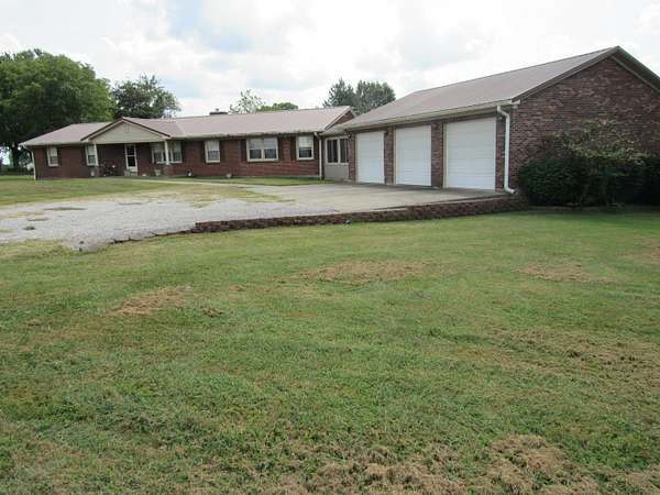 14.9 Acres of Land with Home for Sale in Winchester, Kentucky