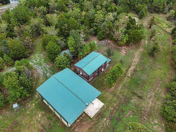 47.8 Acres of Land with Home for Sale in Snow, Oklahoma