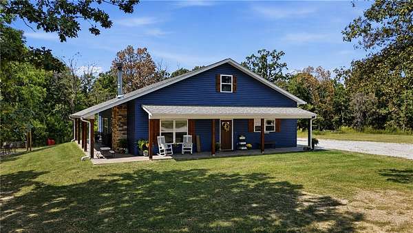 28.5 Acres of Recreational Land with Home for Sale in Goodman, Missouri