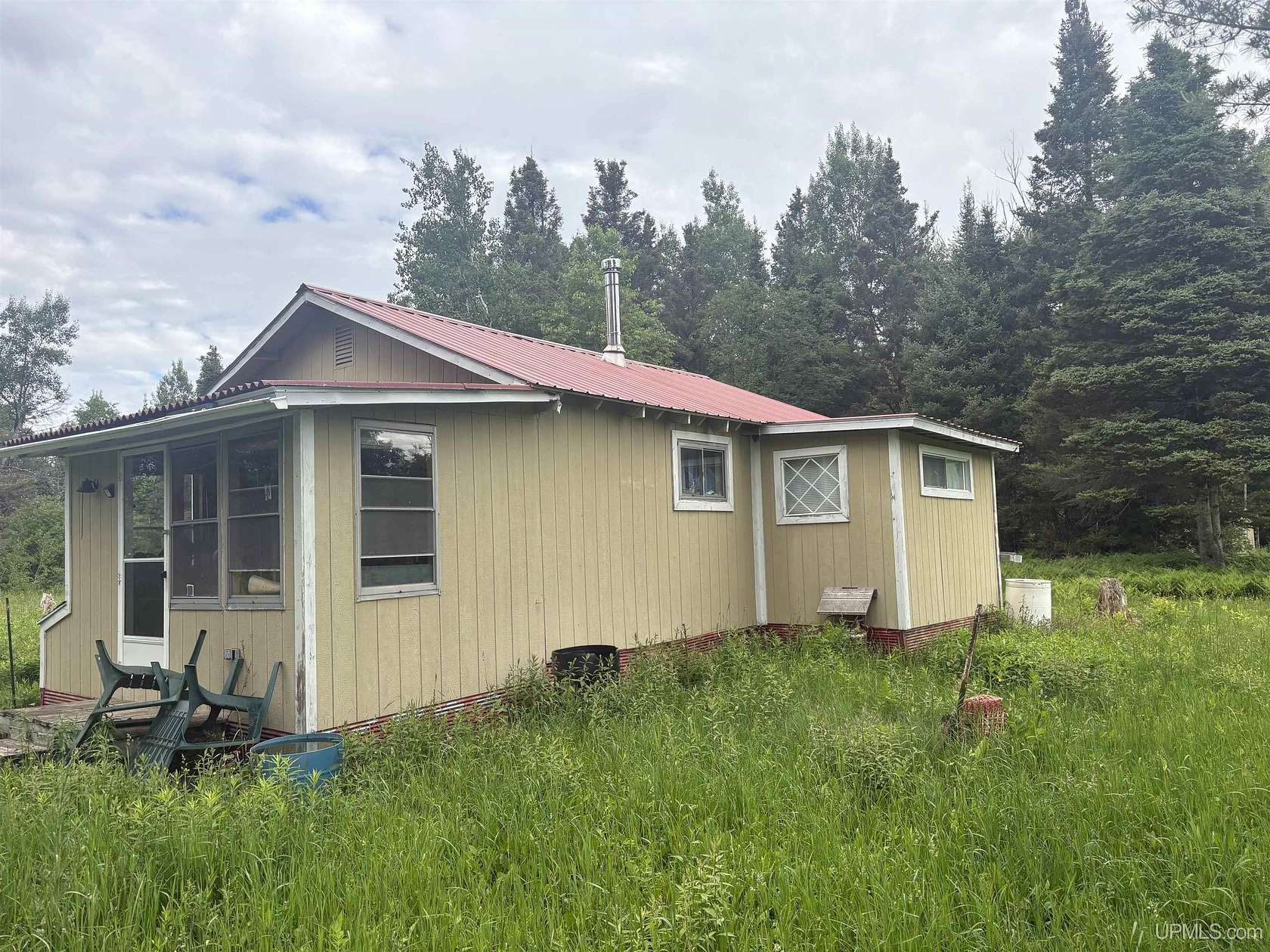 40 Acres of Recreational Land with Home for Sale in Rock, Michigan