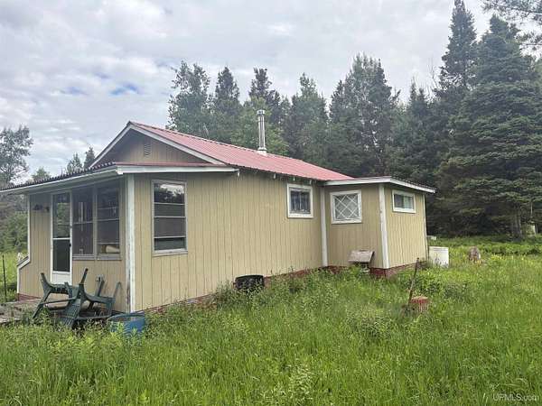 40 Acres of Recreational Land with Home for Sale in Rock, Michigan