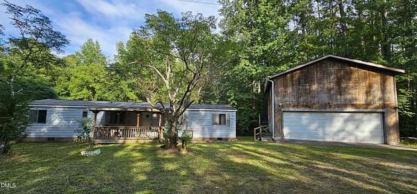 23.6 Acres of Recreational Land with Home for Sale in Graham, North Carolina