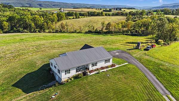 150 Acres of Land with Home for Sale in Tyrone, Pennsylvania
