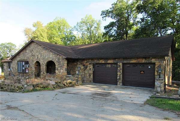 4.1 Acres of Land with Home for Auction in Windsor, Ohio
