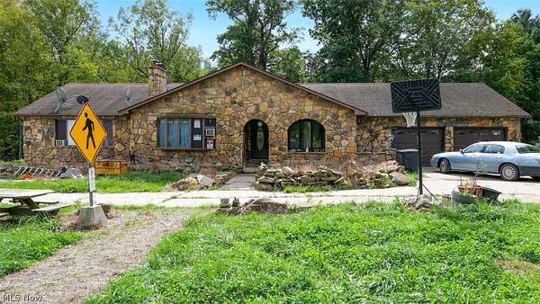 4.1 Acres of Land with Home for Auction in Windsor, Ohio