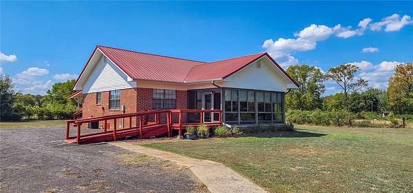2.73 Acres of Land with Home for Sale in Knoxville, Arkansas