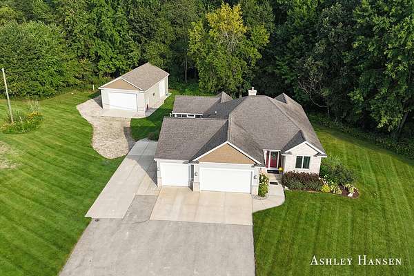 3 Acres of Land with Home for Sale in Rockford, Michigan