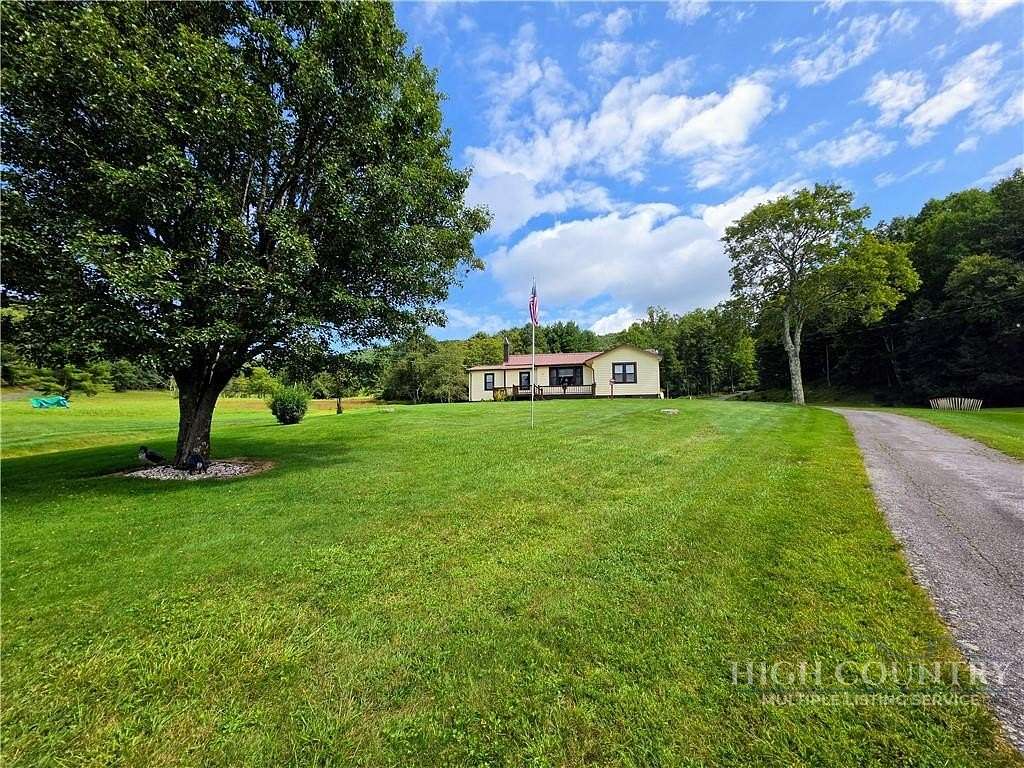 5 Acres of Land with Home for Sale in Laurel Springs, North Carolina