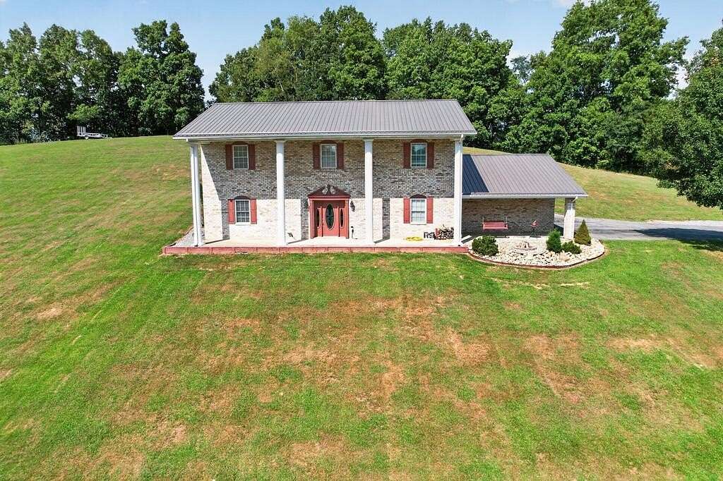5.72 Acres of Land with Home for Sale in Pounding Mill, Virginia