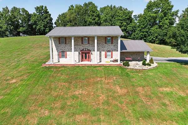 5.72 Acres of Land with Home for Sale in Pounding Mill, Virginia