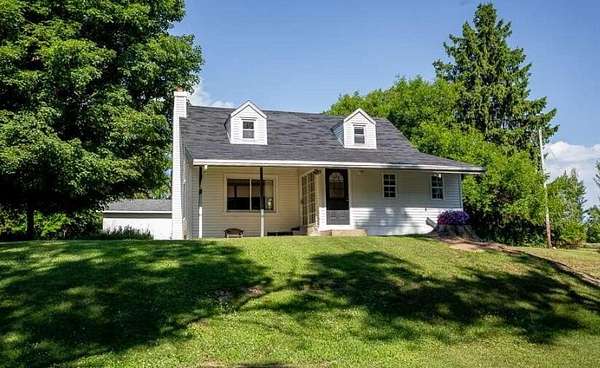 2.4 Acres of Land with Home for Sale in Clarklake, Michigan