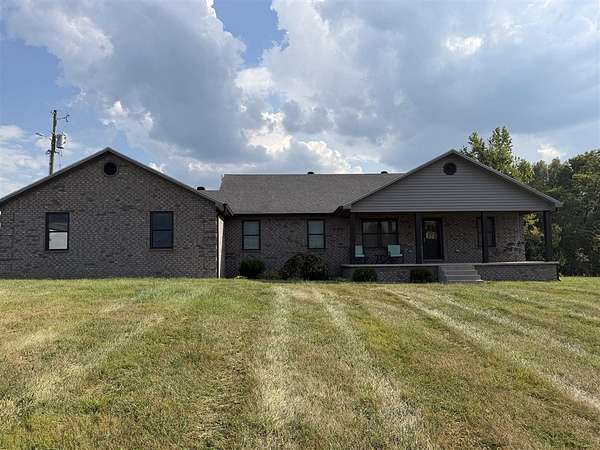 28 Acres of Agricultural Land with Home for Sale in Summer Shade, Kentucky