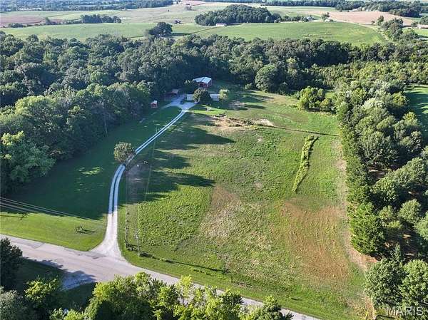 7 Acres of Land with Home for Sale in Oak Ridge, Missouri