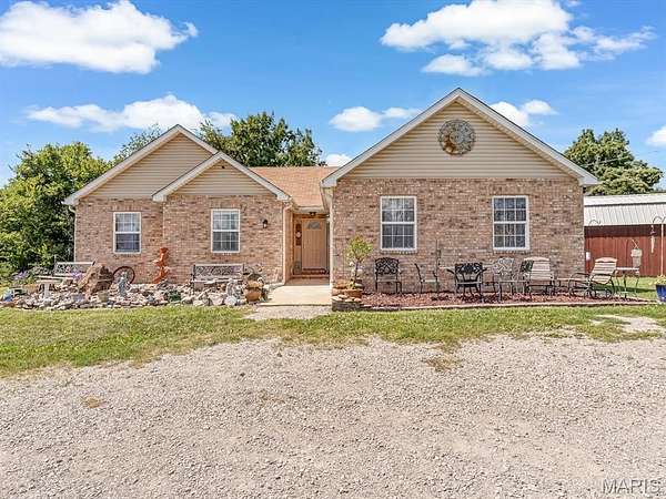11.3 Acres of Land with Home for Sale in Godfrey, Illinois